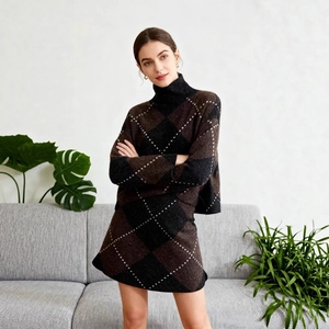 Women's knit set with high-neck sweater and diamond pattern skirt on model in home setting