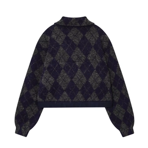 Detailed back view of short argyle knit cardigan in navy blue and charcoal grey tones