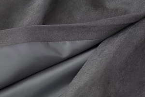 Close-up of charcoal grey wool coat showing premium double-layer fabric and silky lining