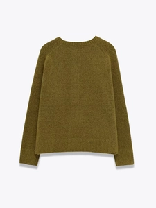 Detailed back view of an olive green knit sweater with raglan sleeves and ribbed cuffs