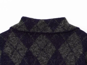 Detail of diamond pattern knit cardigan with soft mohair texture and ribbed collar