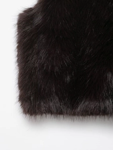 Close-up detail of high-quality dark brown faux fur texture with natural glossy sheen