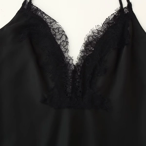 Elegant black satin camisole top with delicate V-neck lace trim and silky texture