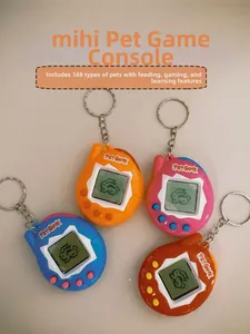 Detail of colorful mini electronic pet game consoles with 168 built-in pets and keychains
