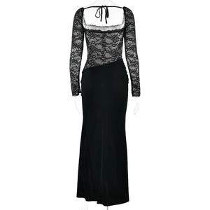 Detail of the backless design with delicate lace stitching and lace-up ribbons on black dress