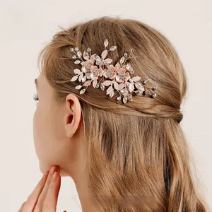 Detail of rose gold bridal hair clip with 3D floral crystals and handmade wirework