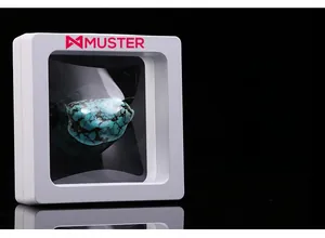 Macro view of a white PE film floating jewelry box featuring a turquoise gemstone display