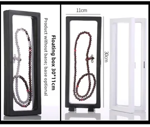 Detail of 30x11cm PE membrane floating jewelry display cases in black and white options