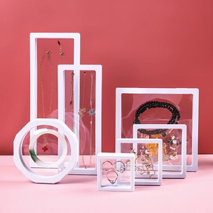 Various sizes of white PE film floating jewelry display boxes for necklaces and rings