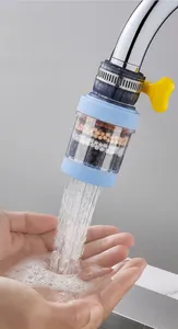 Close-up of blue water filter nozzle showing multi-layer mineral filtration stones