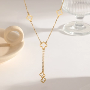Long gold clover fringe necklace for women made of polished stainless steel