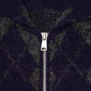 Women's purple diamond pattern knit cardigan with metallic zipper and plush texture