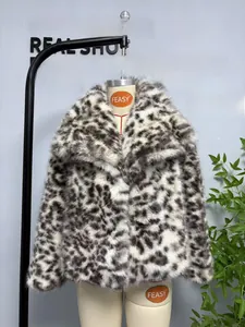 Detail of faux fur leopard print coat with a wide collar and thick plush texture