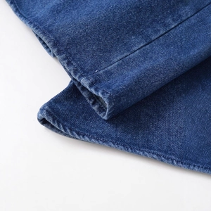 Deep blue denim shirt featuring long sleeves and vintage lapel collar with clean stitching