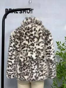 Macro detail of high-quality faux fur leopard print texture on a wide collar coat