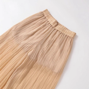 Chic beige high waist pleated wide leg trousers with textured elastic waist finish