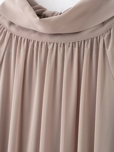 Detail of cowl neck design with shirring on a dusty pink chiffon dress for women