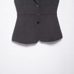 Deep grey V-neck slim fit knitted vest with three black buttons and shaped hemline
