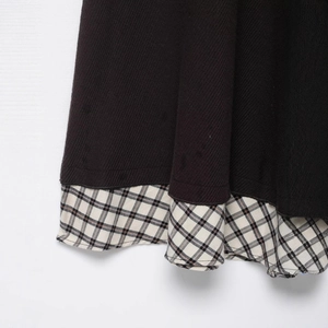 Fashionable brown ribbed knit dress with checkered patchwork hem details for women