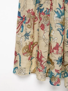Detail of ramie floral print dress showing vintage pattern and natural linen texture