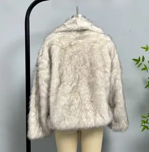 Close-up detail of the elegant faux fur coat texture with oversized pointed lapels