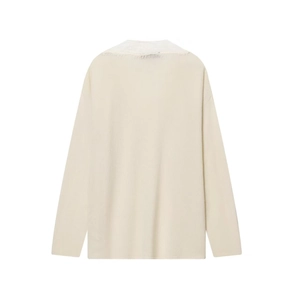 Chic off-white V-neck knit sweater with distressed frayed edges and loose fit design