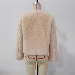 Back view of cream faux fur jacket with thick fleece texture and drop shoulder design