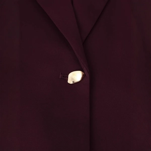 Deep red tailored blazer for women with unique pebble-shaped gold metal button detail