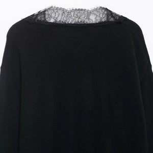 Women's black knit sweater with V-neck floral lace trim and delicate eyelash lace detail