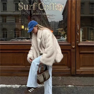 Elegant white faux fur coat with oversized lapels for a stylish winter urban casual look