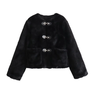 Detail of black faux fur jacket featuring silver metal buckles and large front pockets