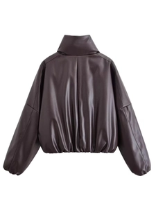 Detail view of deep brown faux leather jacket with high collar and elastic hemline