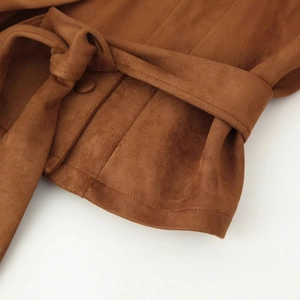 Brown faux suede jacket featuring waist tie belt and pleated texture detail