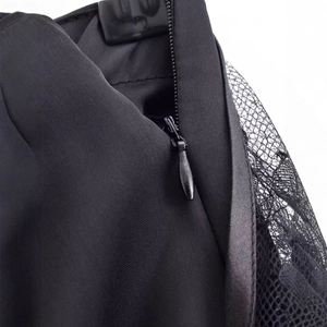 Black satin pants with side invisible zipper and delicate floral lace stitching detail