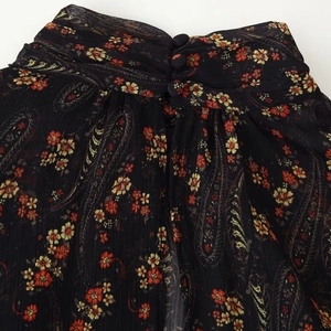 Floral paisley print mini dress with ruffle details and puff sleeves in black chiffon