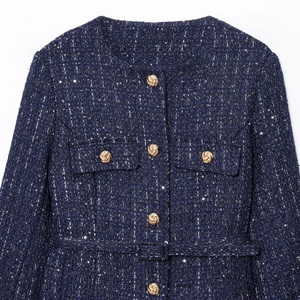 Elegant navy blue tweed jacket for women featuring gold buttons and subtle sequins