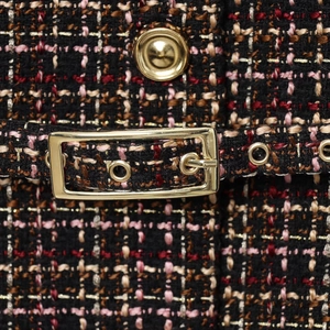 Women's textured tweed vest with multicolored weave and golden metallic buckle detail