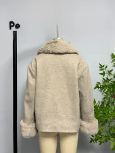 Rear view detail of a beige wool-blend short jacket with fluffy faux fur collar and cuffs