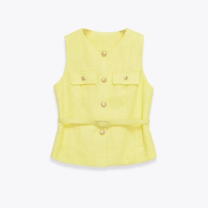 Elegant pale yellow tweed vest for women with golden buttons and a waist belt
