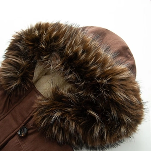 Short brown parka featuring a plush faux fur collar and warm beige fleece lining