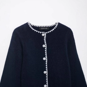 Navy blue knitted cardigan with round neck and elegant light gray scalloped embroidery