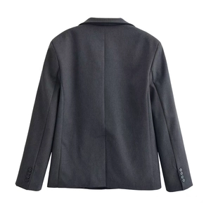 Back view of charcoal grey double-breasted suit jacket with back vent and four buttons