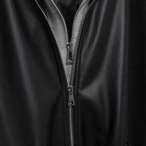Faux leather jacket with premium double metal zippers and textured black finish