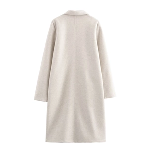 Back view of light beige long wool coat with vertical seam and minimalist tailored design