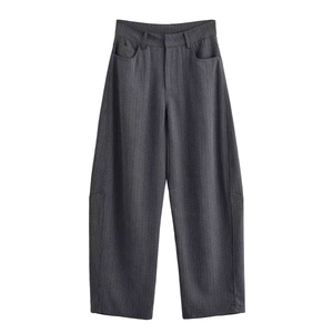 Detail of high-waisted dark grey pinstripe wide-leg trousers with vertical texture