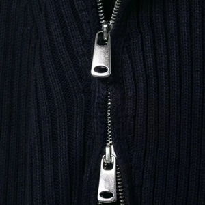 Navy blue ribbed knit jacket featuring a functional double silver zipper detail