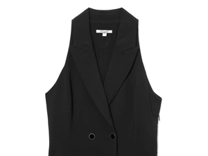 Detail of tailored black blazer dress featuring double-breasted buttons and Zederi label