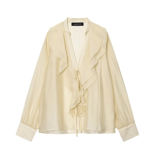 Pale yellow chiffon v-neck blouse with ruffled layers and elegant tie detailing