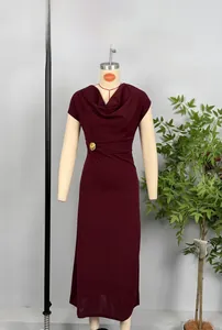 Detail view of burgundy cowl neck maxi dress featuring a golden metallic waist buckle