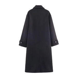 Back view of a long black wool blend coat with minimalist tailoring and back seam detail